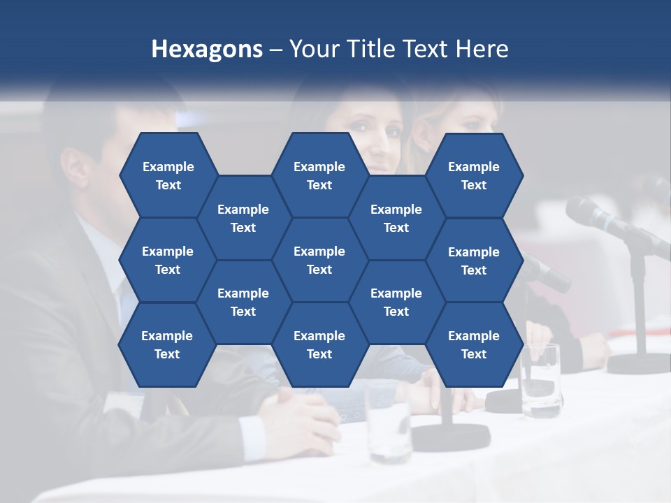 A Group Of People Sitting At A Table With Microphones PowerPoint Template