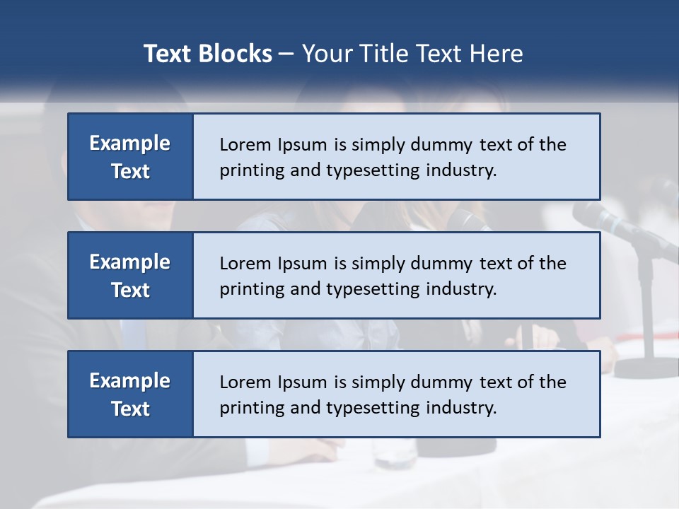 A Group Of People Sitting At A Table With Microphones PowerPoint Template