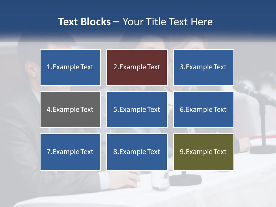 A Group Of People Sitting At A Table With Microphones PowerPoint Template