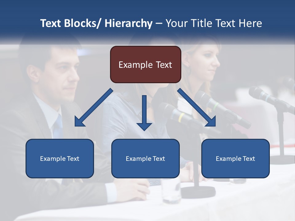 A Group Of People Sitting At A Table With Microphones PowerPoint Template