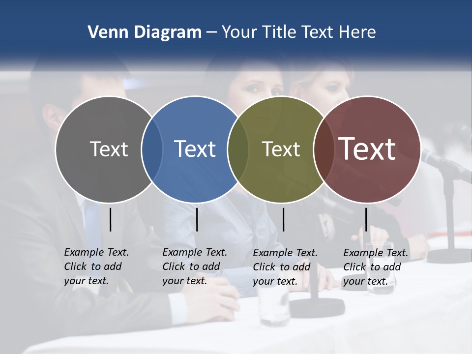 A Group Of People Sitting At A Table With Microphones PowerPoint Template