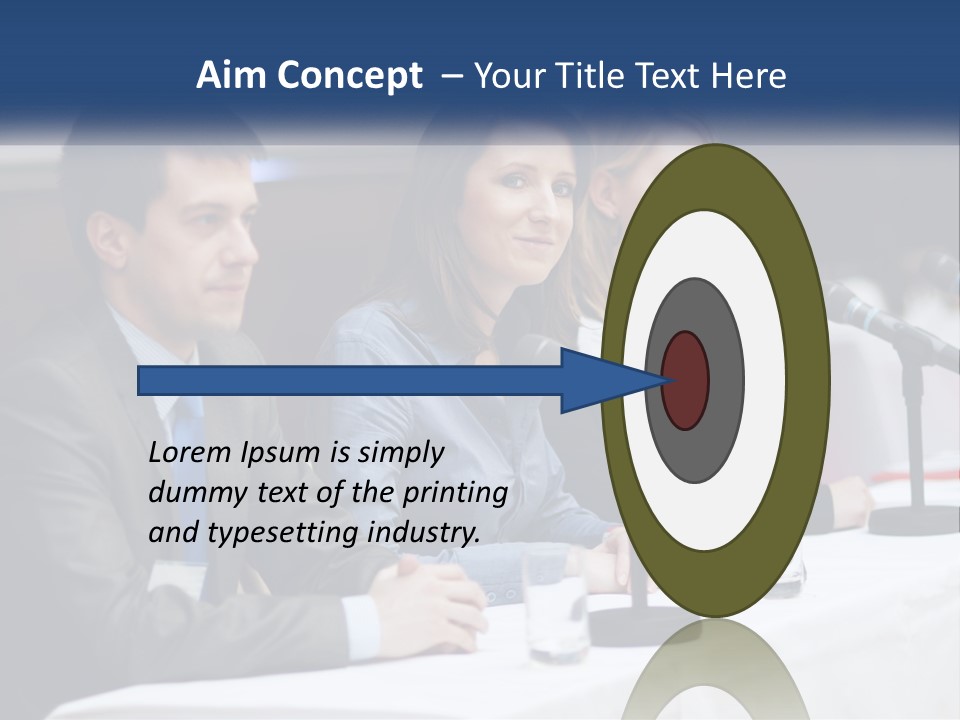 A Group Of People Sitting At A Table With Microphones PowerPoint Template