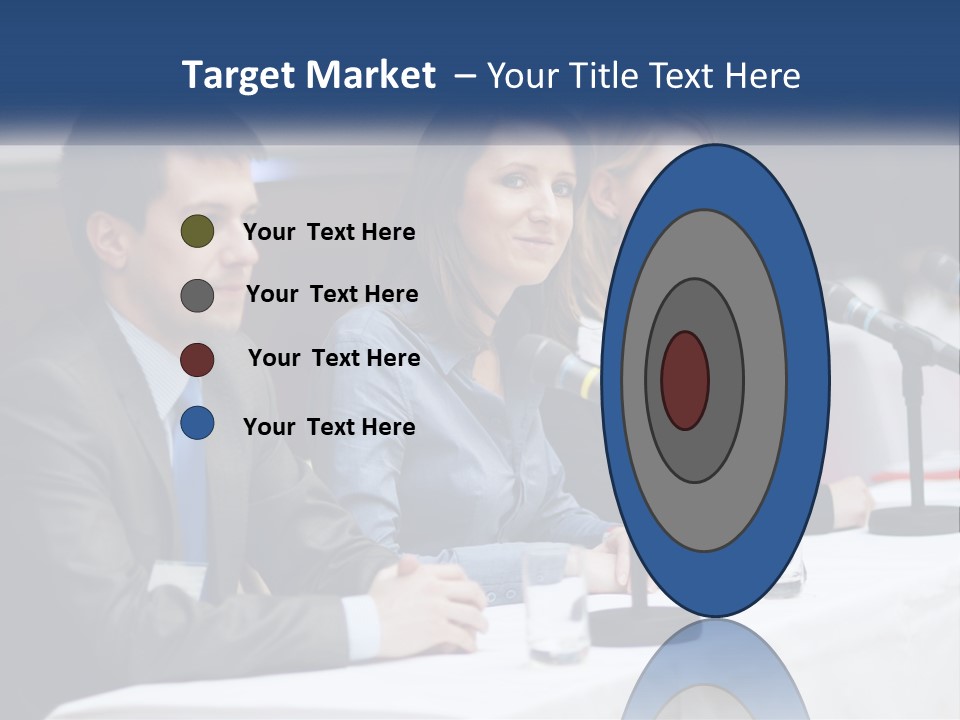 A Group Of People Sitting At A Table With Microphones PowerPoint Template