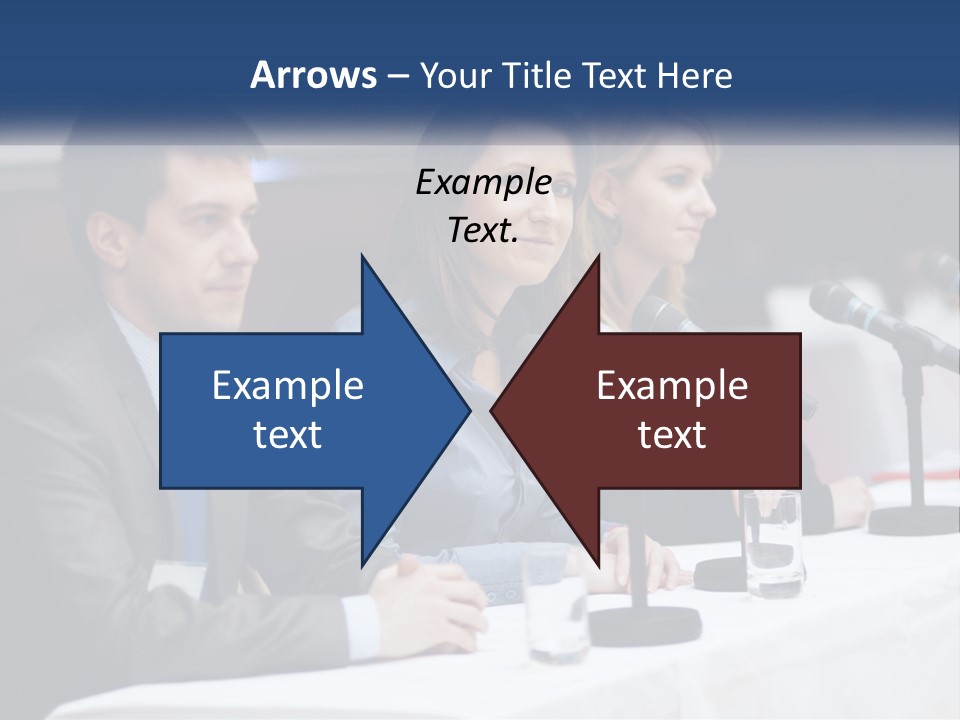 A Group Of People Sitting At A Table With Microphones PowerPoint Template