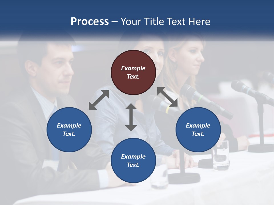A Group Of People Sitting At A Table With Microphones PowerPoint Template