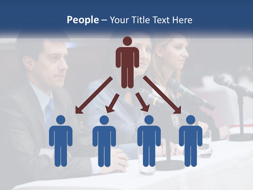 A Group Of People Sitting At A Table With Microphones PowerPoint Template
