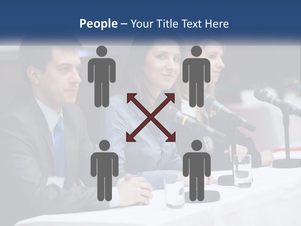 A Group Of People Sitting At A Table With Microphones PowerPoint Template