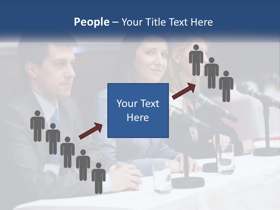 A Group Of People Sitting At A Table With Microphones PowerPoint Template