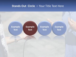 A Person Holding A Microphone With A Microphone In Front Of Them PowerPoint Template