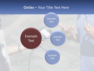 A Person Holding A Microphone With A Microphone In Front Of Them PowerPoint Template