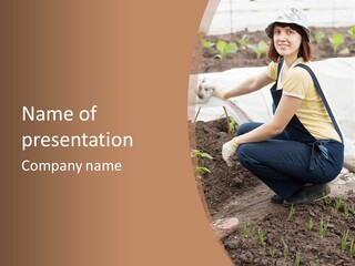 A Woman Kneeling Down In A Field With A Dog PowerPoint Template