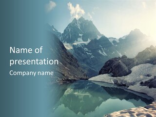 A Mountain Range With A Lake In The Foreground PowerPoint Template