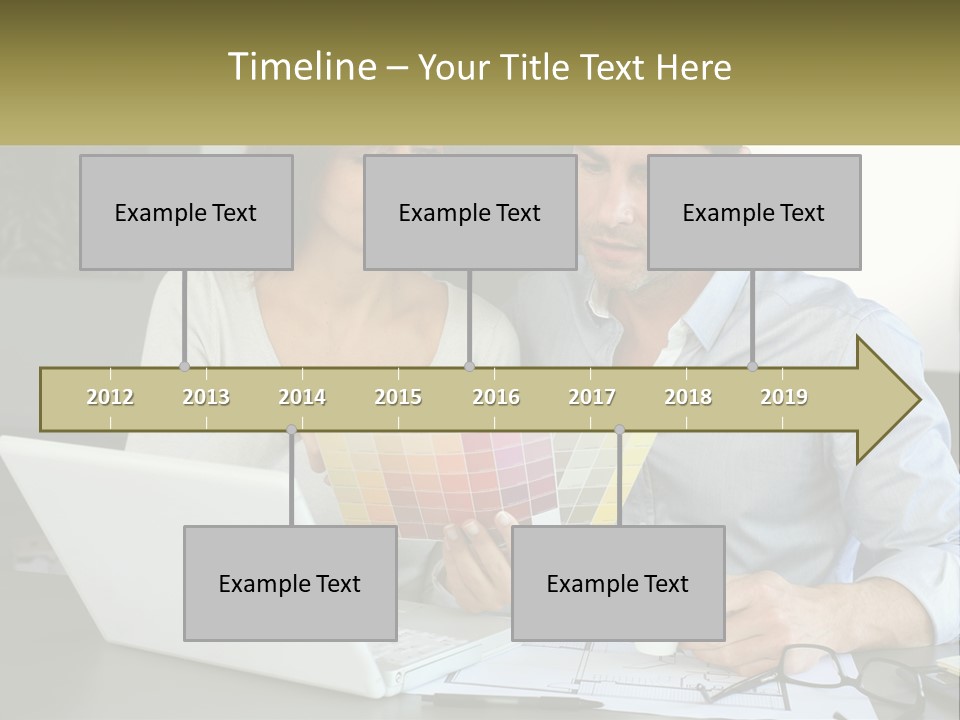 A Man And A Woman Looking At A Laptop Screen PowerPoint Template