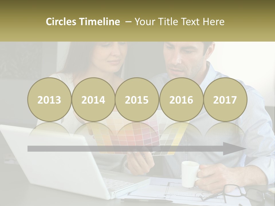 A Man And A Woman Looking At A Laptop Screen PowerPoint Template