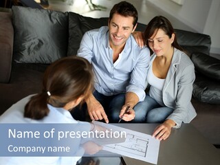 A Man And Woman Sitting On A Couch Looking At A Blueprint PowerPoint Template