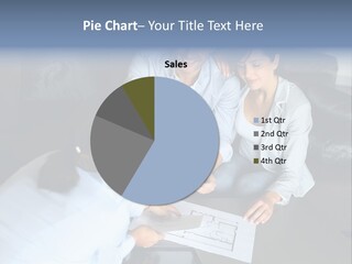 A Man And Woman Sitting On A Couch Looking At A Blueprint PowerPoint Template