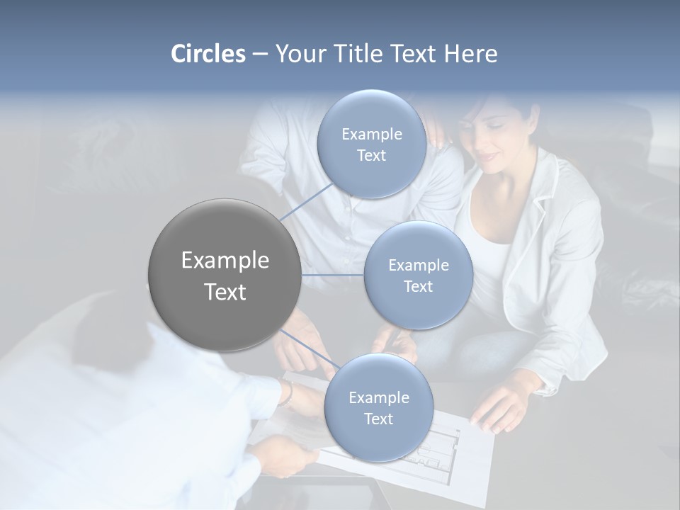 A Man And Woman Sitting On A Couch Looking At A Blueprint PowerPoint Template
