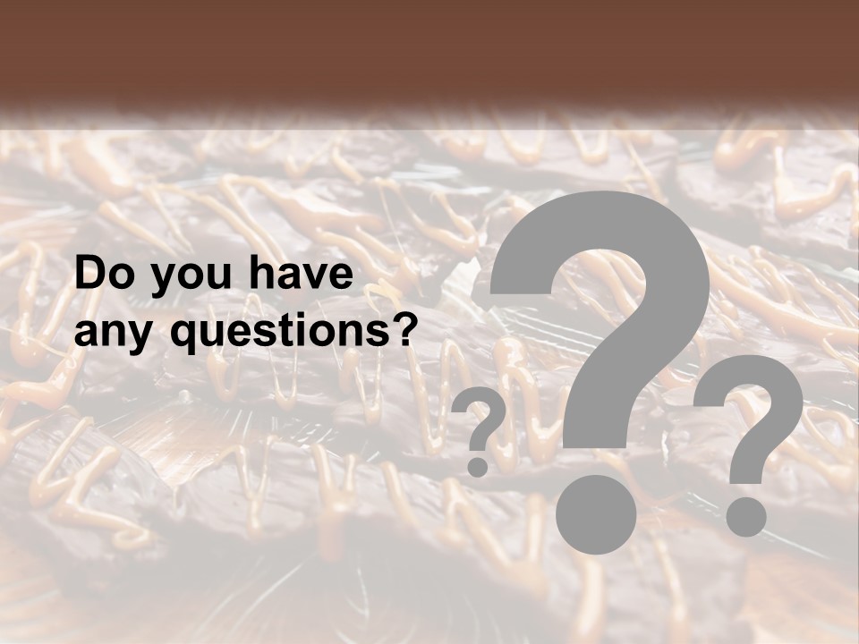 A Plate Full Of Chocolate Covered Cookies With Caramel Drizzles PowerPoint Template