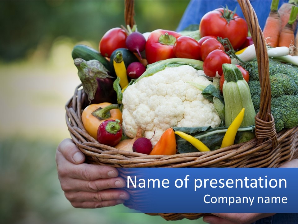 A Person Holding A Basket Full Of Vegetables PowerPoint Template