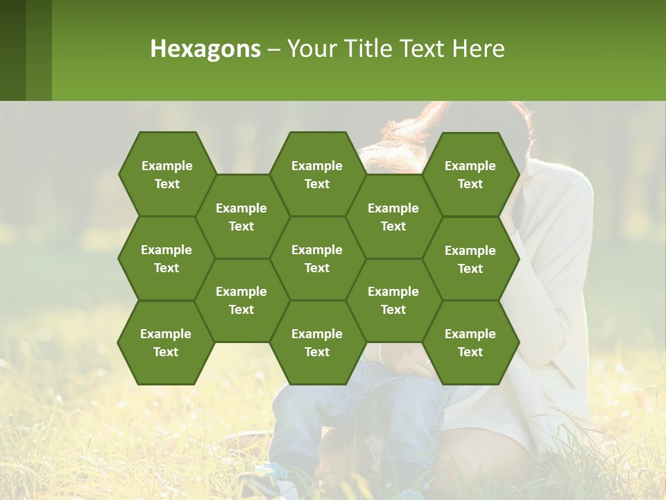 A Woman Holding A Baby In A Field Of Grass PowerPoint Template