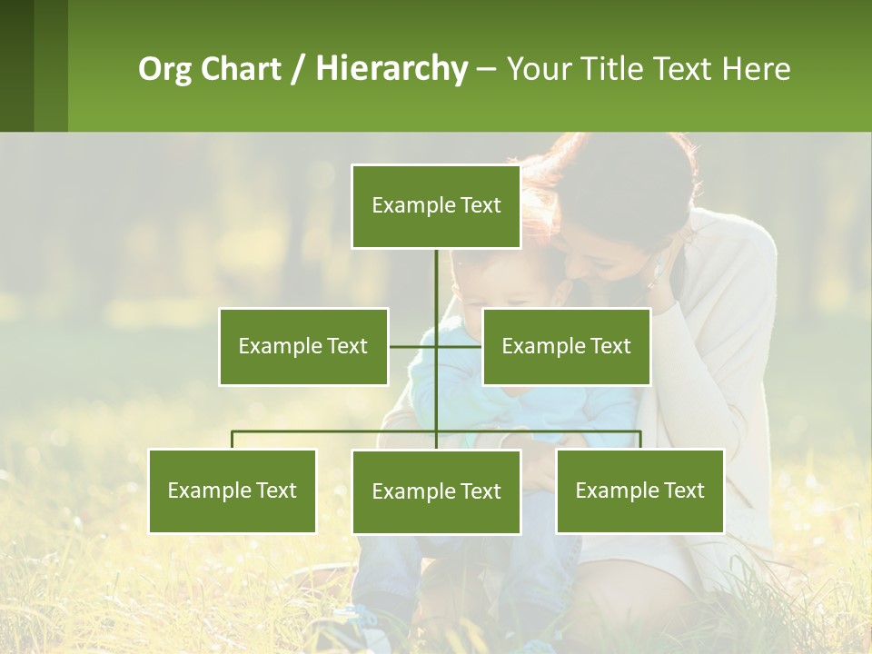 A Woman Holding A Baby In A Field Of Grass PowerPoint Template