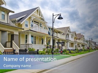 A Row Of Houses With A Street Light In Front Of Them PowerPoint Template