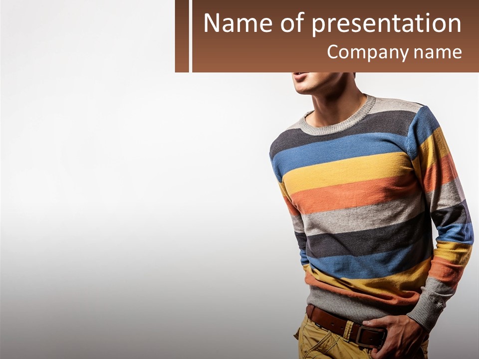 A Man In A Striped Sweater Is Holding His Hands In His Pockets PowerPoint Template