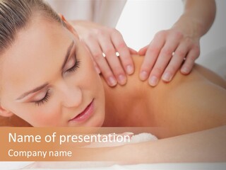 A Woman Getting A Back Massage From A Massager PowerPoint Template