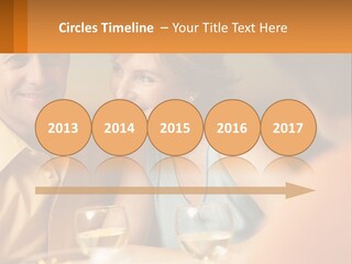 A Man And Woman Sitting At A Table With A Glass Of Wine PowerPoint Template