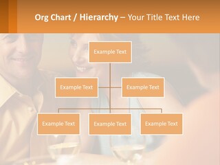 A Man And Woman Sitting At A Table With A Glass Of Wine PowerPoint Template