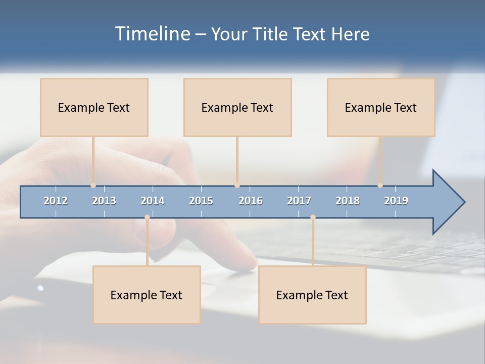 A Person Using A Laptop Computer On A Desk PowerPoint Template