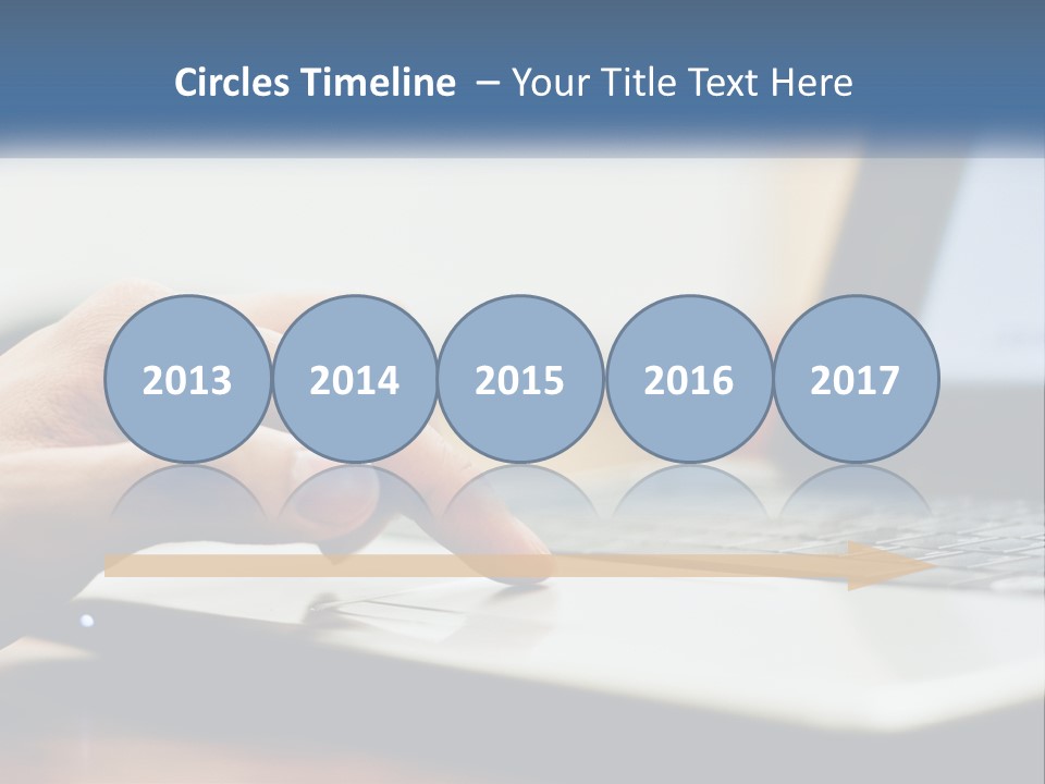 A Person Using A Laptop Computer On A Desk PowerPoint Template