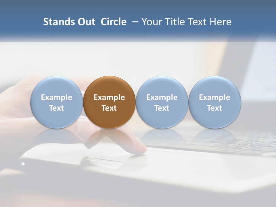 A Person Using A Laptop Computer On A Desk PowerPoint Template