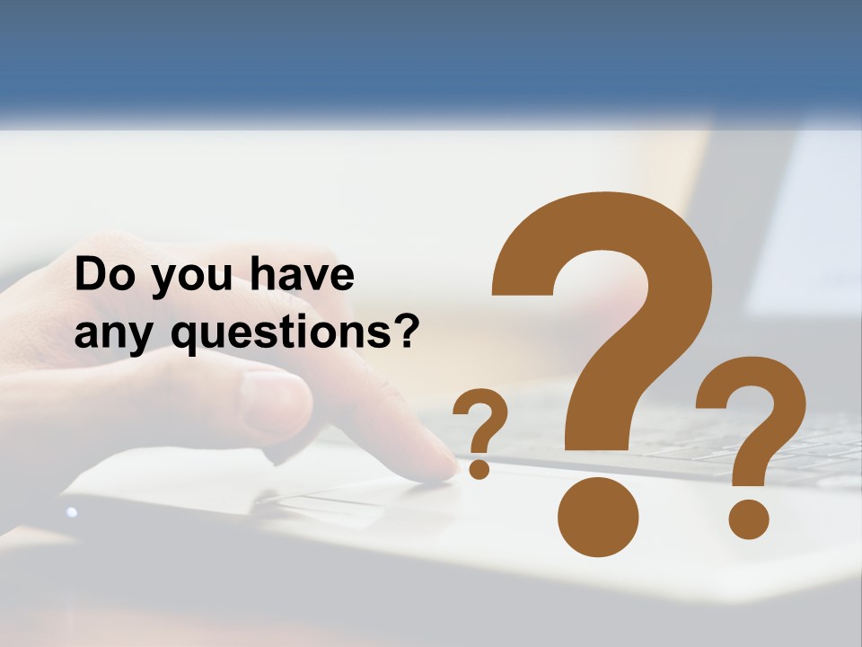 A Person Using A Laptop Computer On A Desk PowerPoint Template