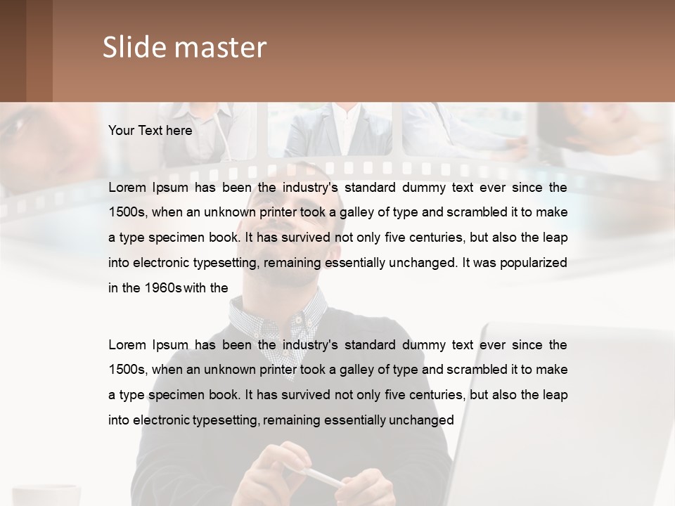 A Man Sitting In Front Of A Laptop Computer PowerPoint Template