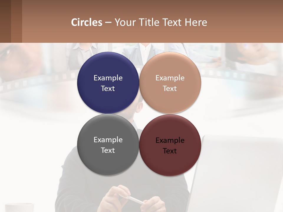 A Man Sitting In Front Of A Laptop Computer PowerPoint Template