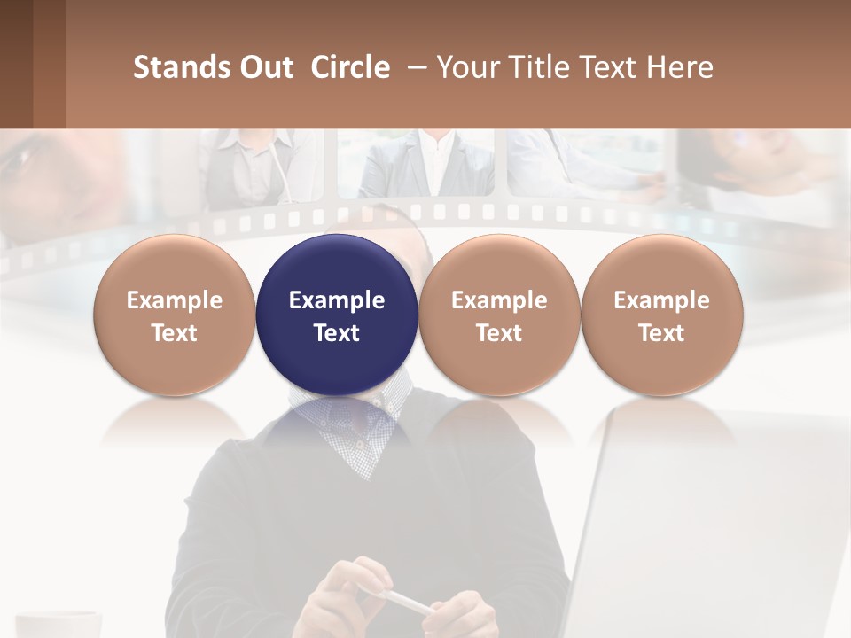 A Man Sitting In Front Of A Laptop Computer PowerPoint Template