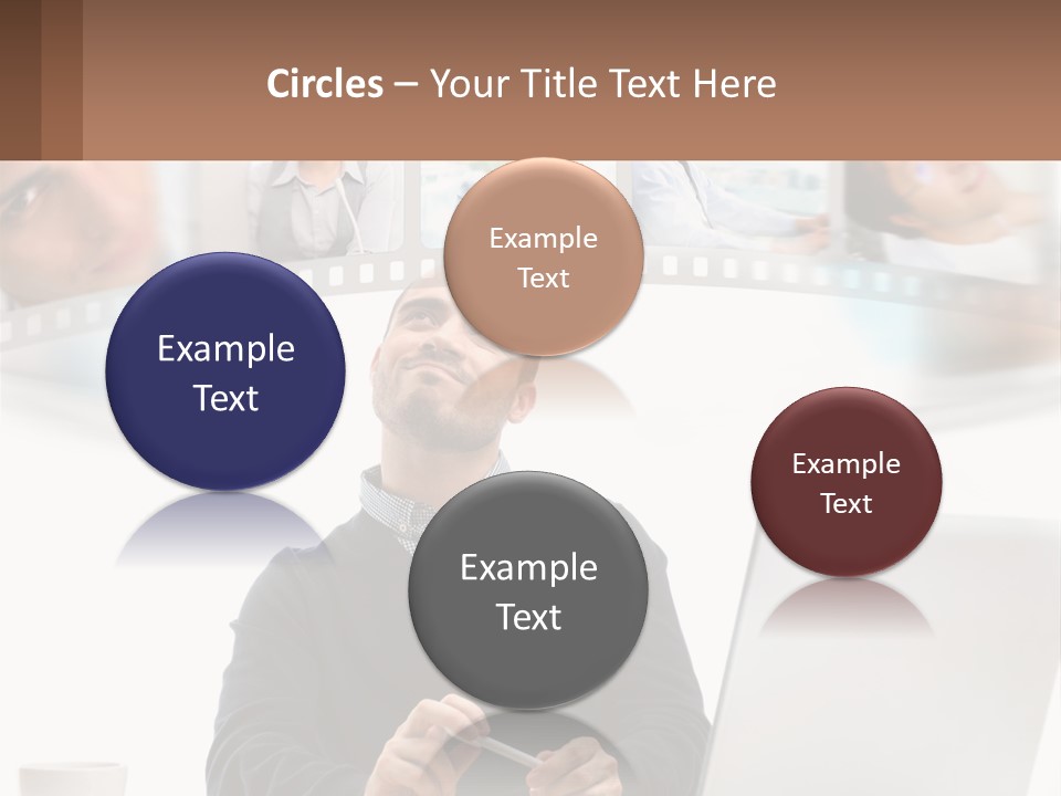 A Man Sitting In Front Of A Laptop Computer PowerPoint Template