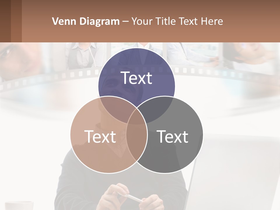 A Man Sitting In Front Of A Laptop Computer PowerPoint Template