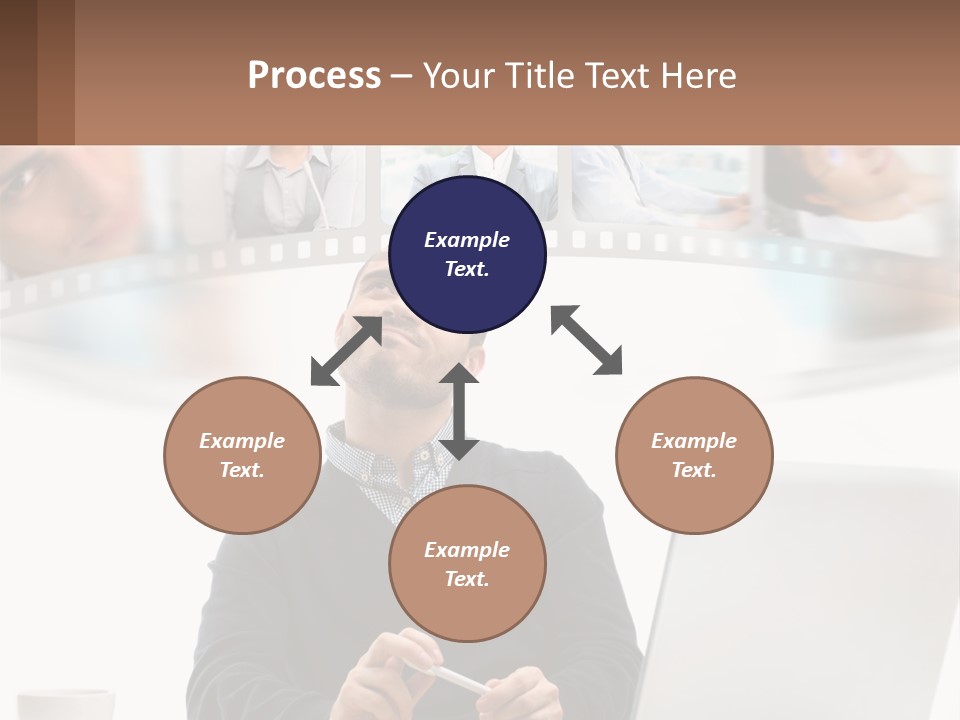 A Man Sitting In Front Of A Laptop Computer PowerPoint Template