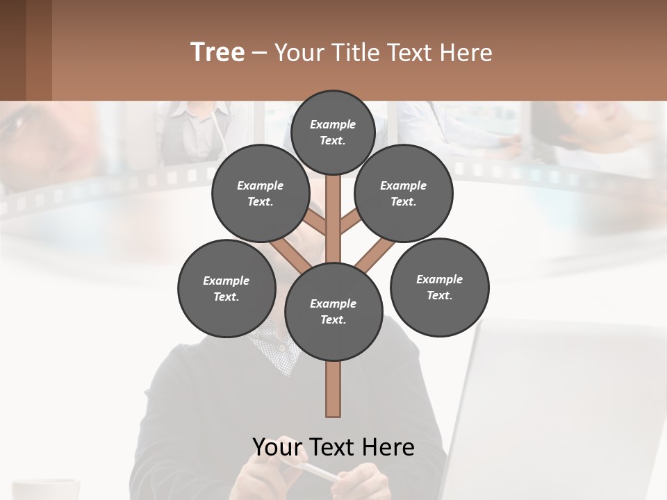 A Man Sitting In Front Of A Laptop Computer PowerPoint Template