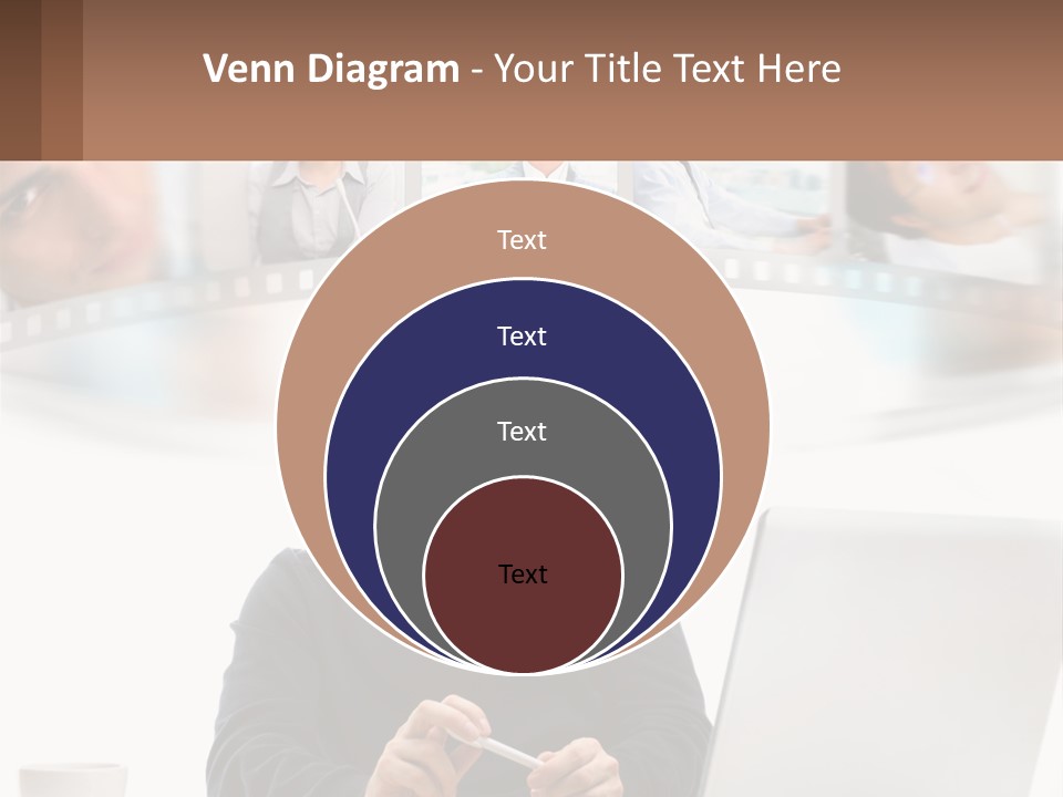 A Man Sitting In Front Of A Laptop Computer PowerPoint Template