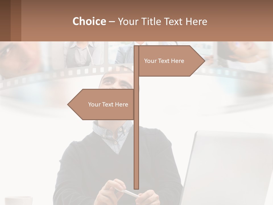 A Man Sitting In Front Of A Laptop Computer PowerPoint Template