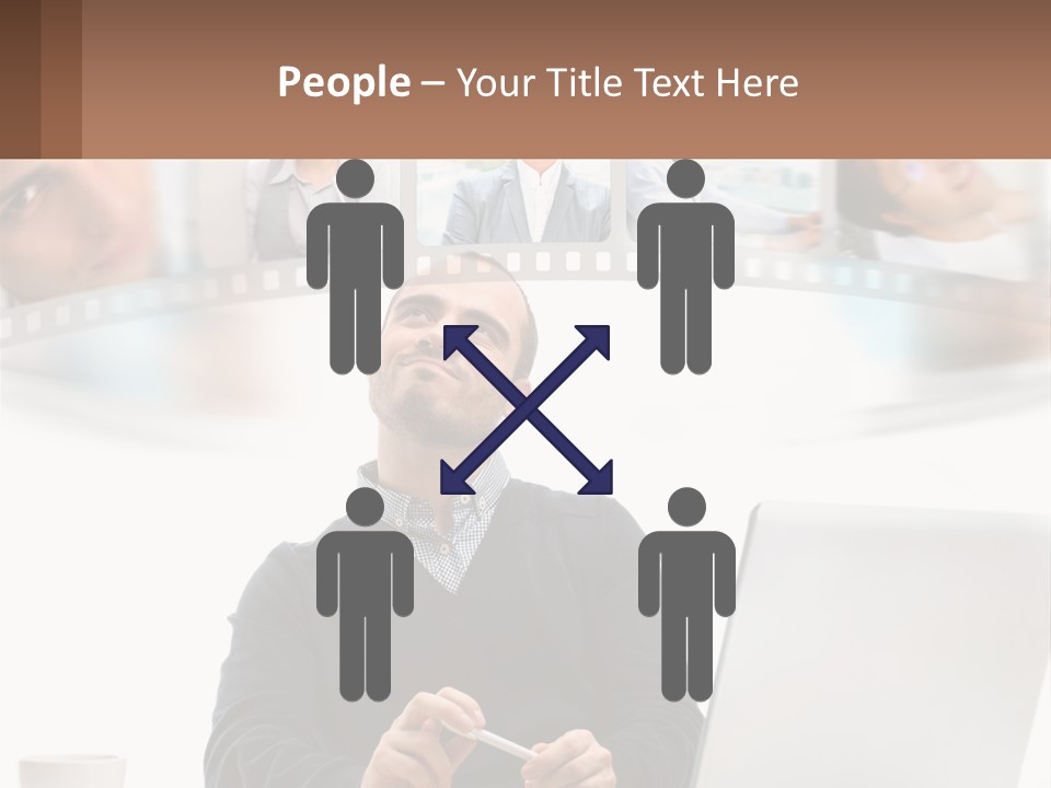 A Man Sitting In Front Of A Laptop Computer PowerPoint Template