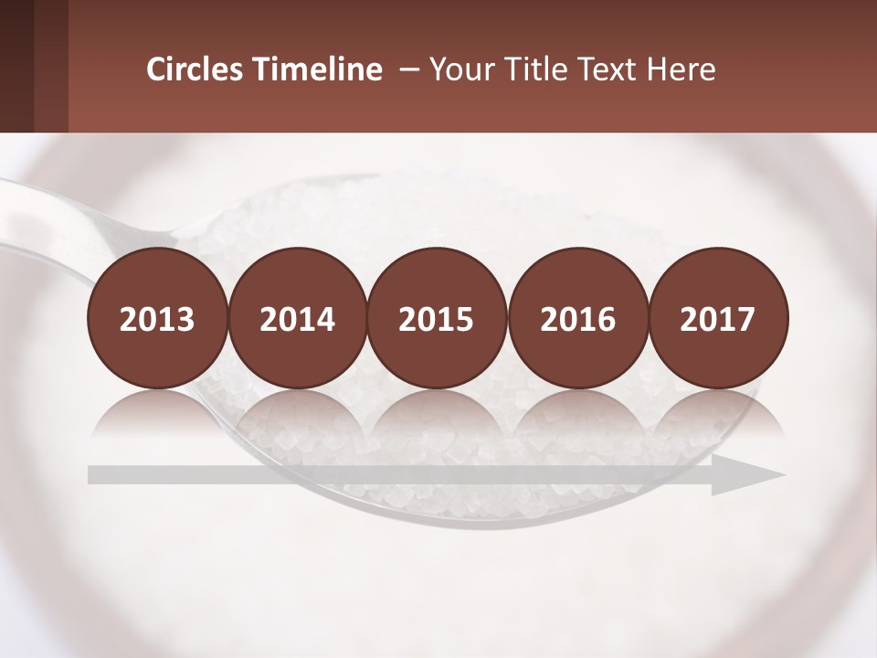 A Spoon Full Of White Sugar In A Bowl PowerPoint Template