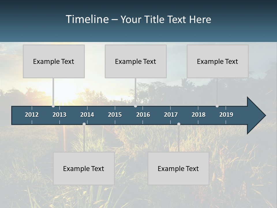 A Field Of Grass With The Sun Setting In The Background PowerPoint Template