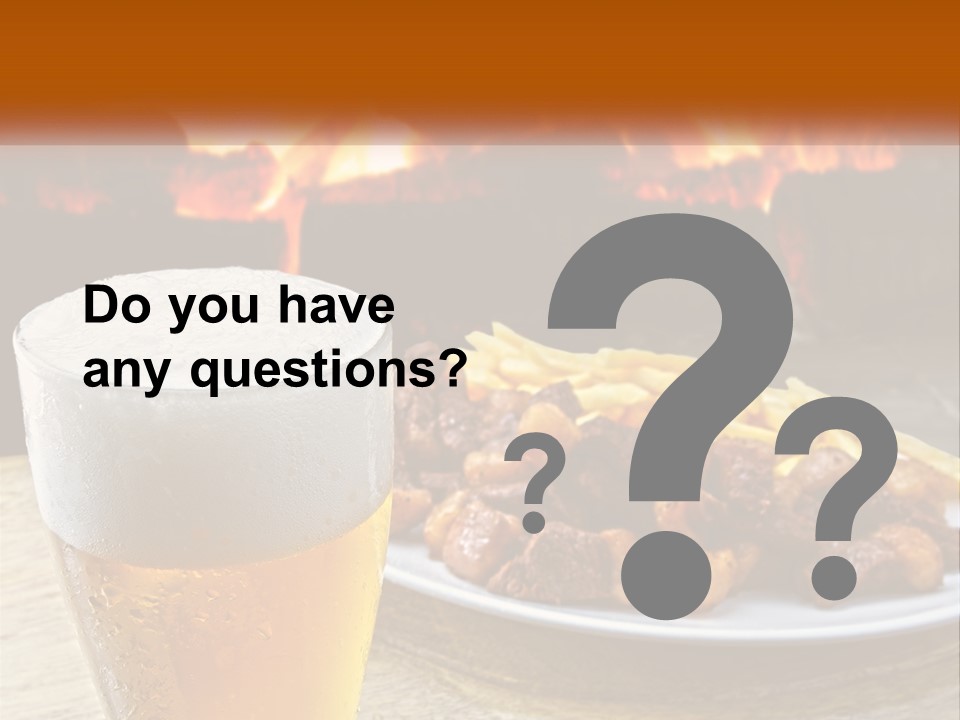 A Plate Of Food And A Glass Of Beer On A Table PowerPoint Template