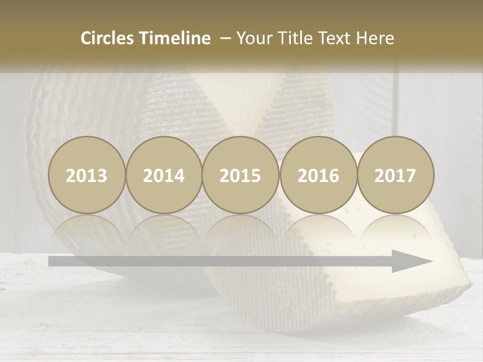 A Piece Of Cheese On Top Of A Wooden Table PowerPoint Template