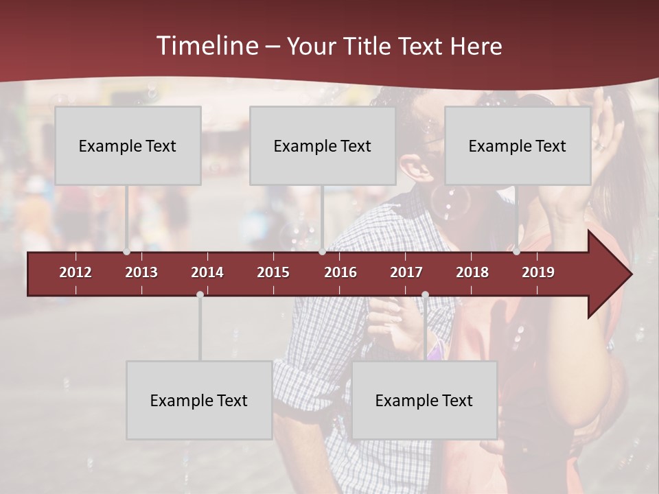 A Man And Woman Are Kissing In Front Of A Crowd Of People PowerPoint Template