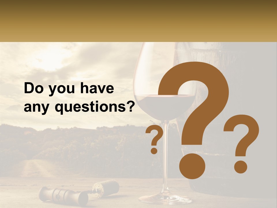A Glass Of Wine Sitting Next To A Barrel PowerPoint Template